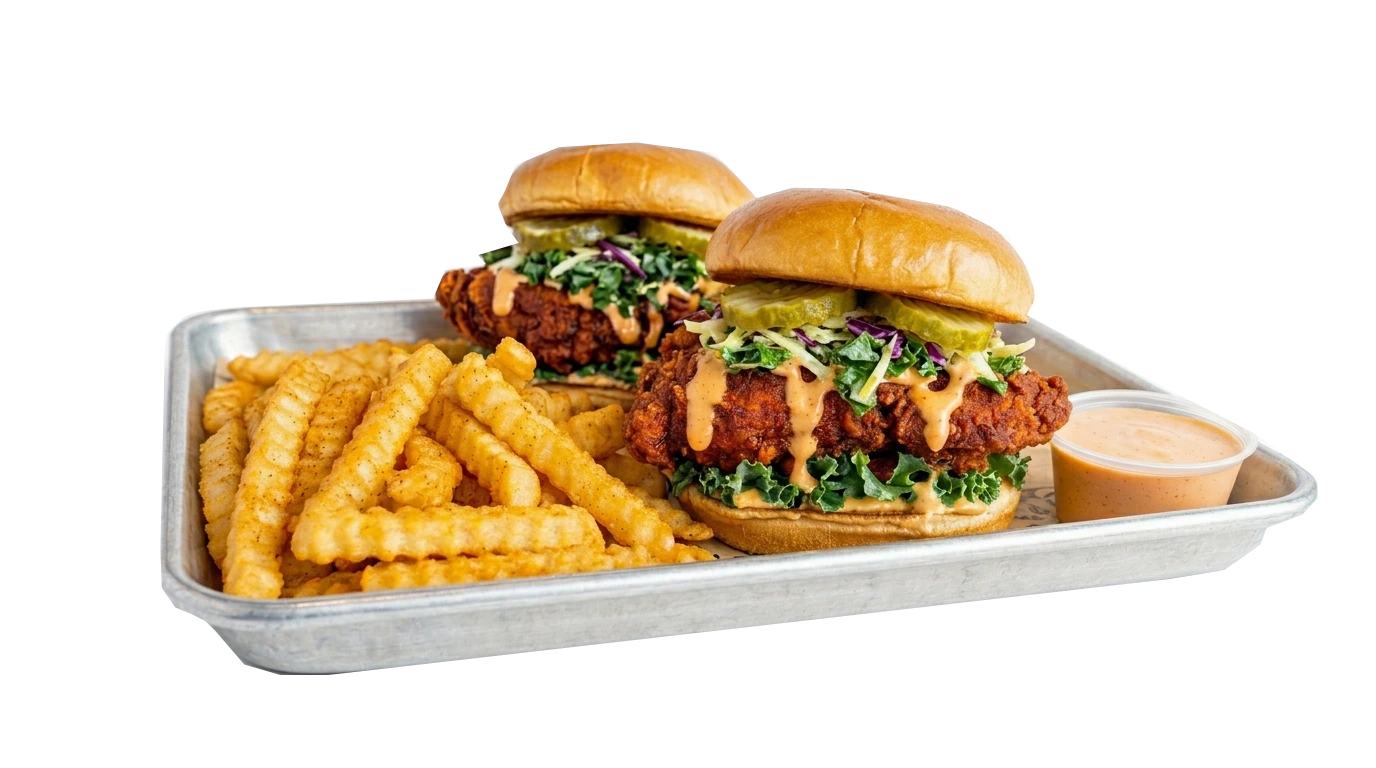 2 sliders with fries featuring crispy chicken sandwiches served with seasoned fries and dipping sauce